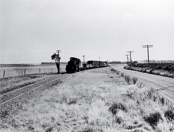 An Ab class Pacific locomotive on the Rakaia-Methven branch line arriving at Rakaia, Mid Canterbury 