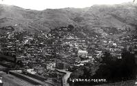 Railway lines at Lyttelton and panoramic view of houses and hills [191-?]
